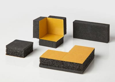 Self-adhesive foam blocks